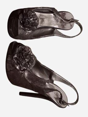 Black and silver Guess 2000s heels with flower